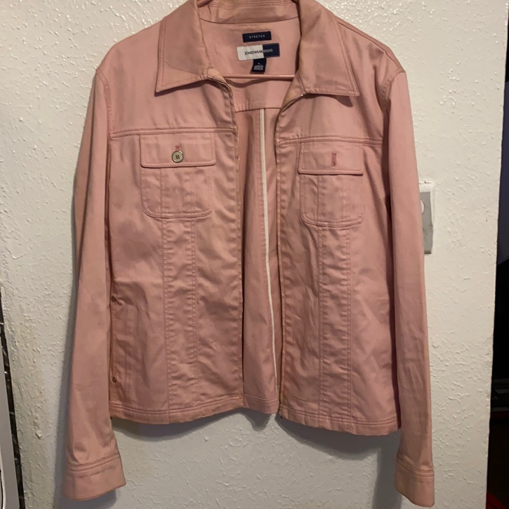 Baby pink zip up jacket.